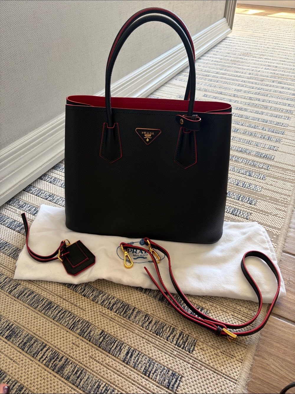 Black Tote with Red Trim and Gold Hardware